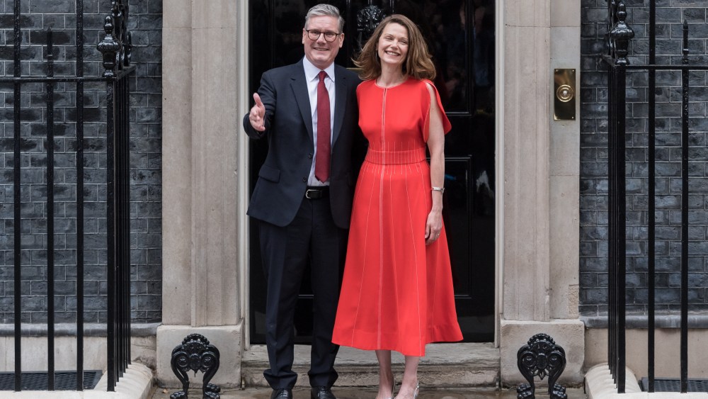LONDON, UNITED KINGDOM - JULY 05: Leader of the Labour Party Sir Keir Starmer and his wife Victoria pose outside 10 Downing Street after being appointed Britain's 58th prime minister following a landslide general election victory in London, United Kingdom on July 05, 2024. (Photo by Wiktor Szymanowicz/Anadolu via Getty Images)