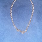 在去珠宝店估价之前我想知道这条项链是用什么制成的？