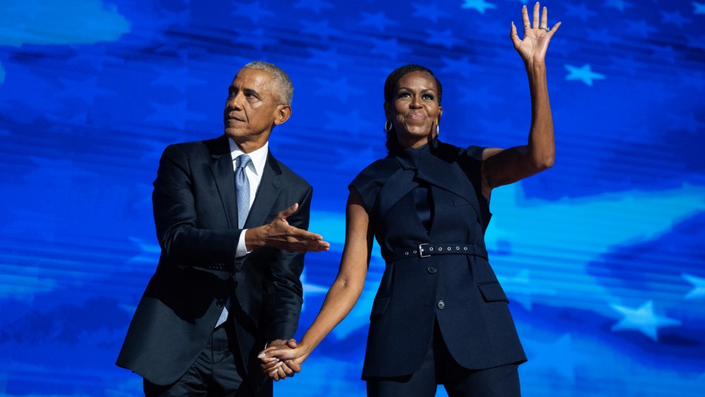 michelle obama wears monse resort 2025 outfit at dnc, Barack and Michelle Obama during the second day of the Democratic National Convention at the United Center on Aug. 20, 2024, in Chicago.