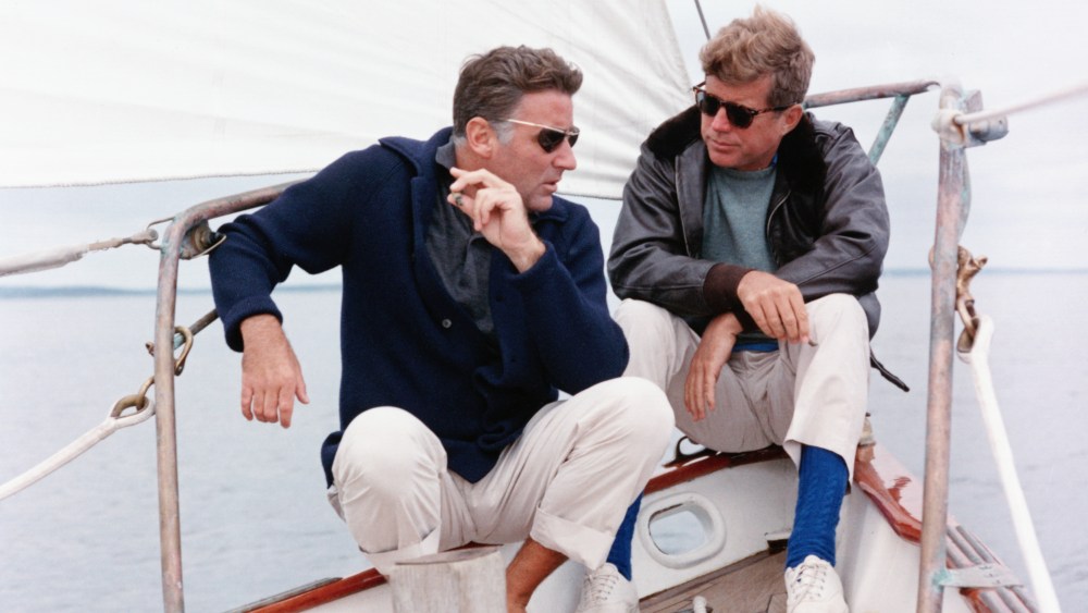 President Kennedy and his brother-in-law Peter Lawford aboard the United States Coast Guard yacht 'Manitou' (Photo by © CORBIS/Corbis via Getty Images)