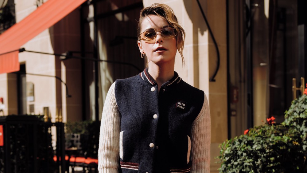 Kiernan Shipka gets ready for the Miu Miu spring 2025 show.