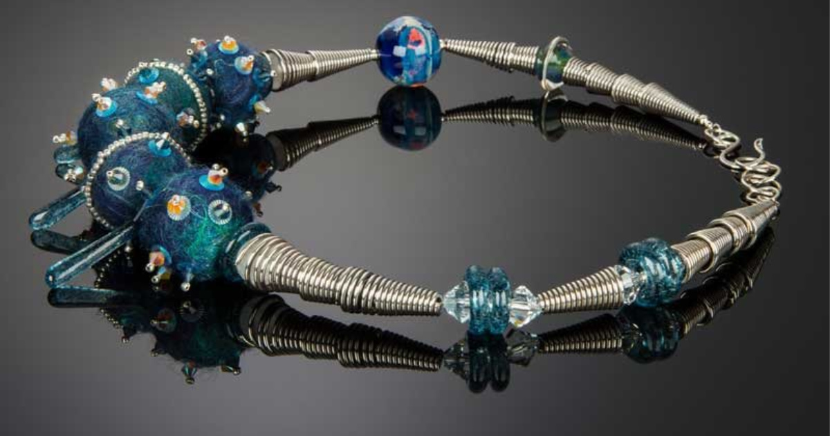 Celestial Orbs Neckpiece by Sandra Lupo with Debra Weiss. Photo: David Orr for the Art of Glass Volumes I and II, International Society Glass Beadmakers.