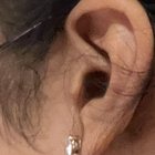 孤独的耳环仍然超过吗？