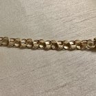 大家好！这种连锁风格叫什么？它的设计看起来像一个三重平面链接，但链接都是一件。