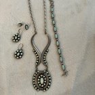 来自 NM 蛋白石的纯银。全部签名