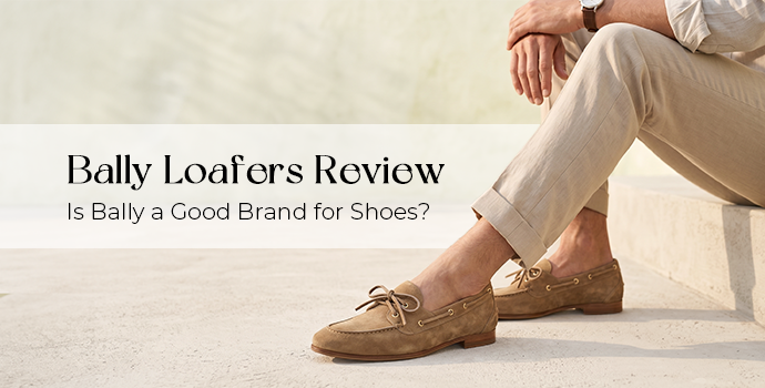 bally loafers review man sitting on stairs with focus on bally loafers brown color