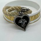 谁能帮我鉴定一下这颗宝石吗？ 谢谢！