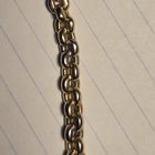 谁能告诉我这是什么类型的链接？我在网上没有找到类似的东西。这是一件价值 15,000 美元的复古单品。