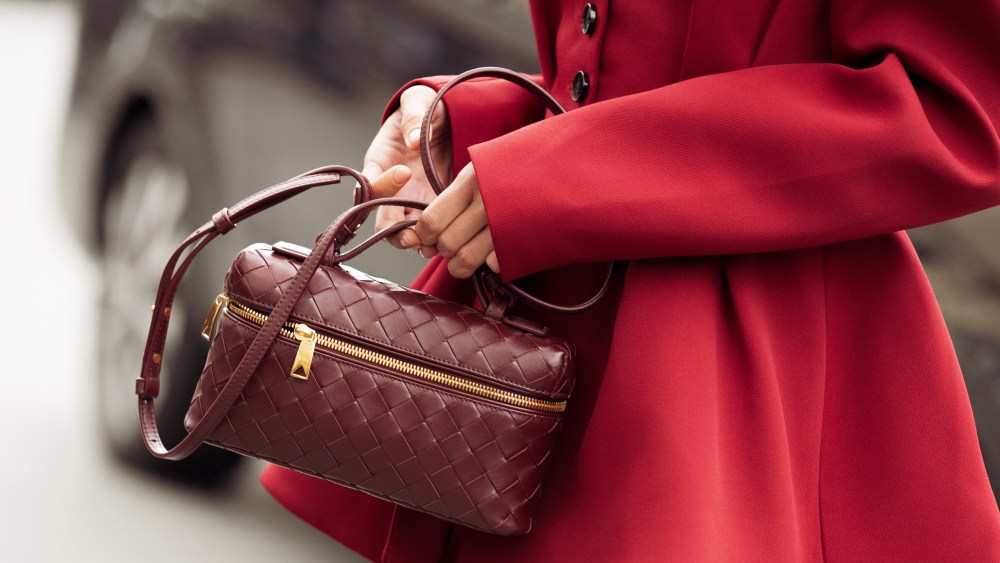 red shoulder bag with silver hardware and chain strap