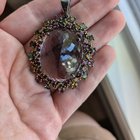 与我拥有的其他纯银相比，为什么这款纯银的颜色如此深？