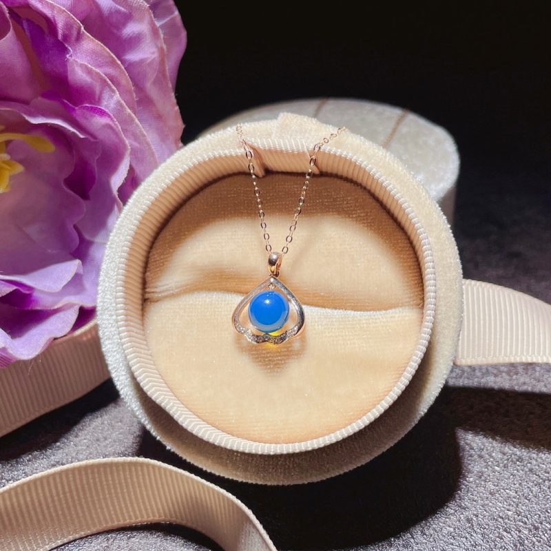 18k Gold Embedded Dominican Blue Amber Pendant - Exquisite Jewelry for Everyday Elegance