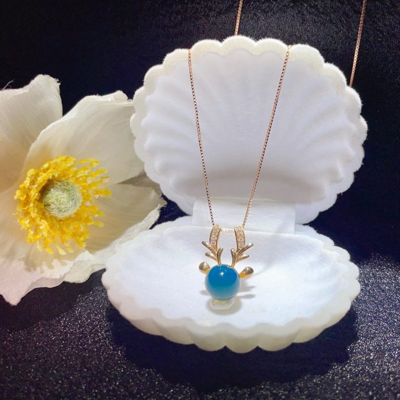 18K Gold Embedded Dominican Blue Amber Pendant - Exquisite Jewelry