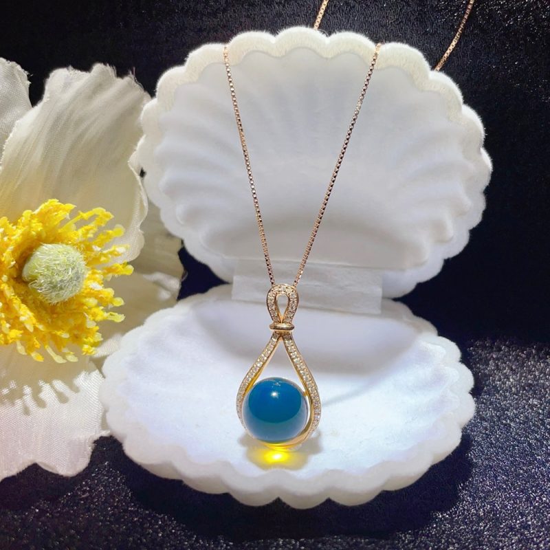 18K Gold Embedded Dominican Blue Amber Pendant - Exquisite Jewelry