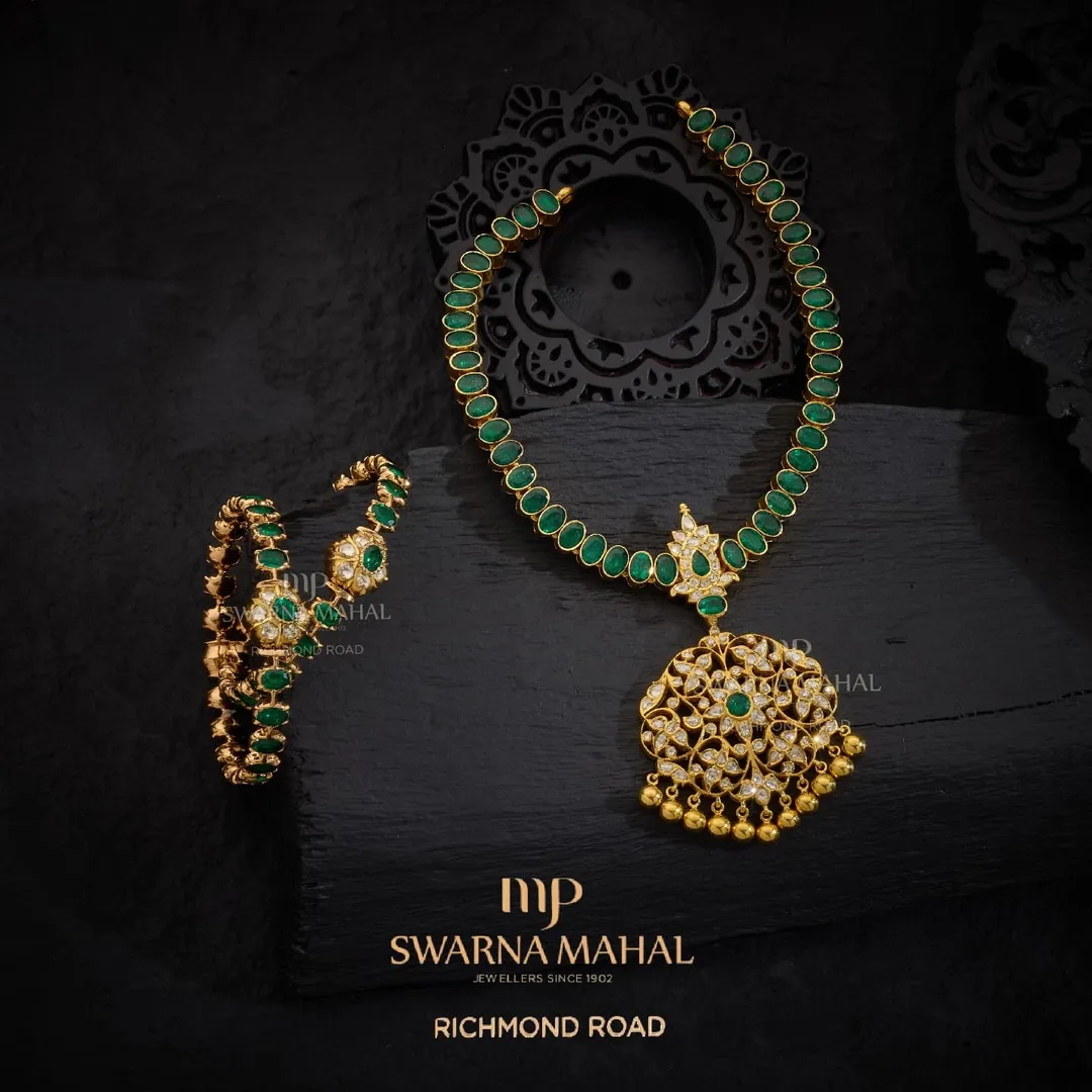 Gold Emerald Stone Jewellery Set From