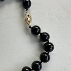 它是什么类型的黑色石头？黄金14k