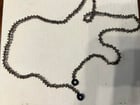 我刚刚完成了这条带有白金连接器的丝质烟熏黄玉打结项链。你怎么认为？