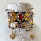 手工缝制的 Pokemon 风格项链。你怎么认为？